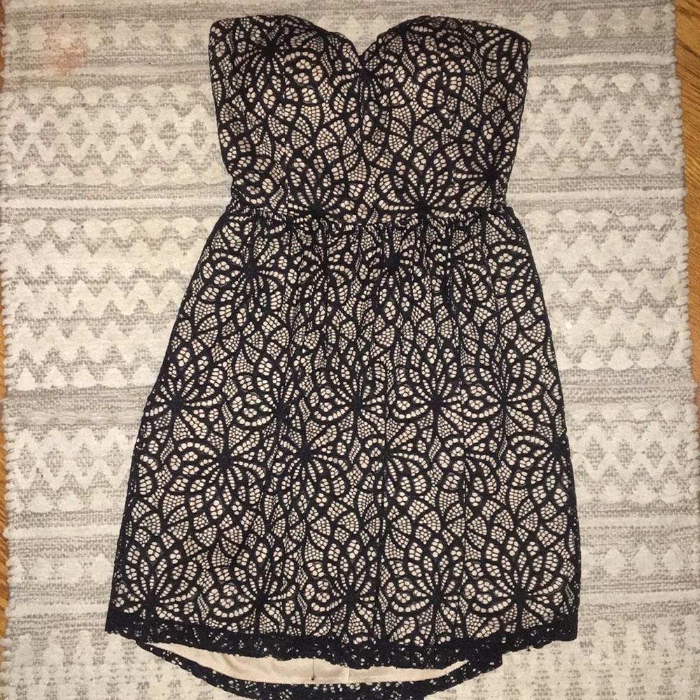 Strapless open back black lace mini dress